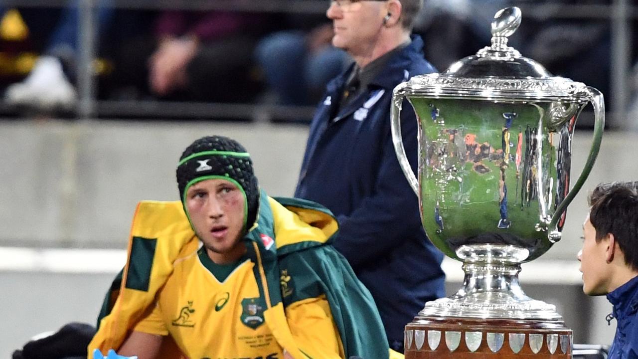Adam Coleman of Australia in the sin bin next to the Bledisloe Cup.