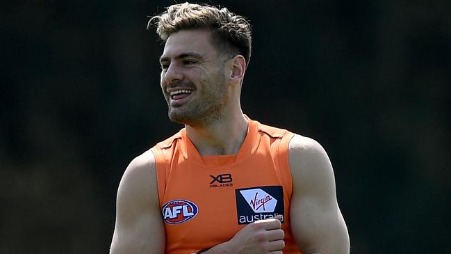 You would be all smiles if you have Stephen Coniglio in your SuperCoach team. Picture: AAP Image/Dan Himbrechts.