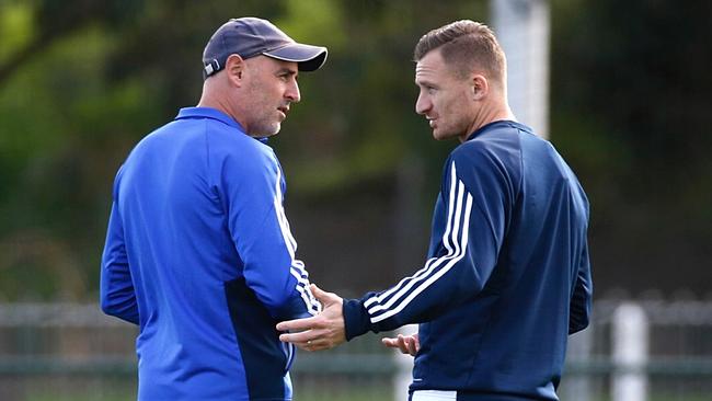 Melbourne Victory coach Kevin Muscat with Besart Berisha during training. Picture: George Salpigtidis