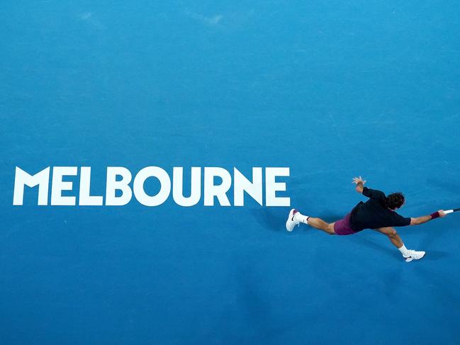 Roger Federer of Switzerland returns a shot during his second round match against Filip Krajinovic of Serbia on day three of the Australian Open tennis tournament at Rod Laver Arena in Melbourne, Wednesday, January 22, 2020. (AAP Image/Michael Dodge) NO ARCHIVING, EDITORIAL USE ONLY