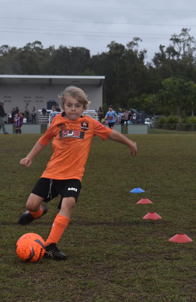 Buderim under 7s players going through some warm-up drills at the Morey Tonen Carnival at Kawana on August 13, 2022. Picture: Eddie Franklin.