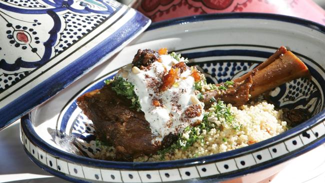 Lamb Shank Tagine served on vegetable cous cous with dried fruits, preserved lemon and pine nuts at Taboon restaurant.