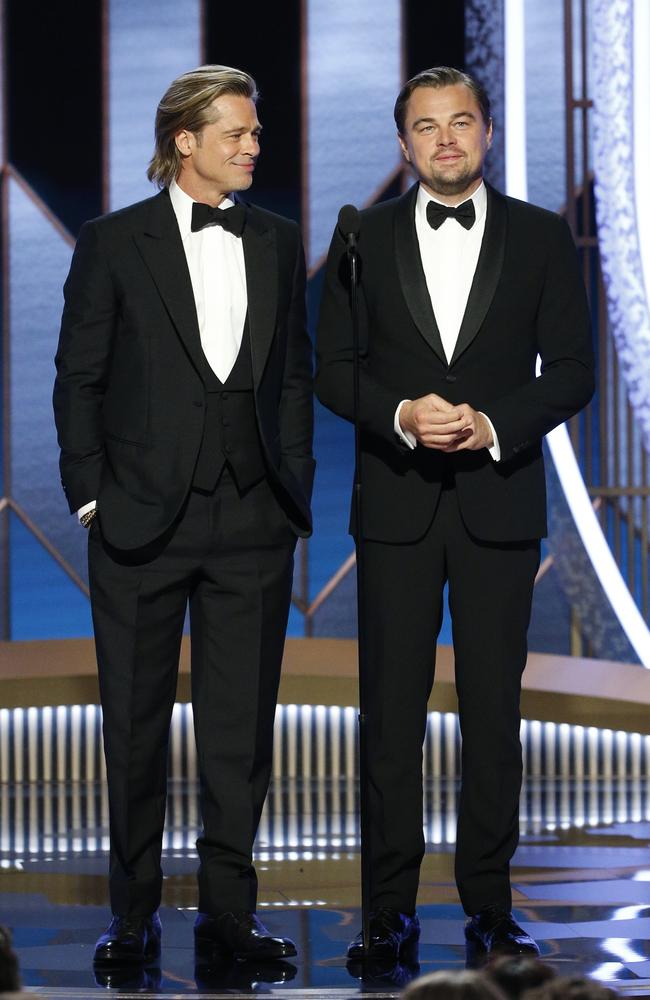 Golden Globe winner Brad Pitt looking adoringly at his Once Upon a Time in Hollywood co-star, Leonardo DiCaprio, while presenting an earlier award. We don’t blame him. Picture: Getty Images