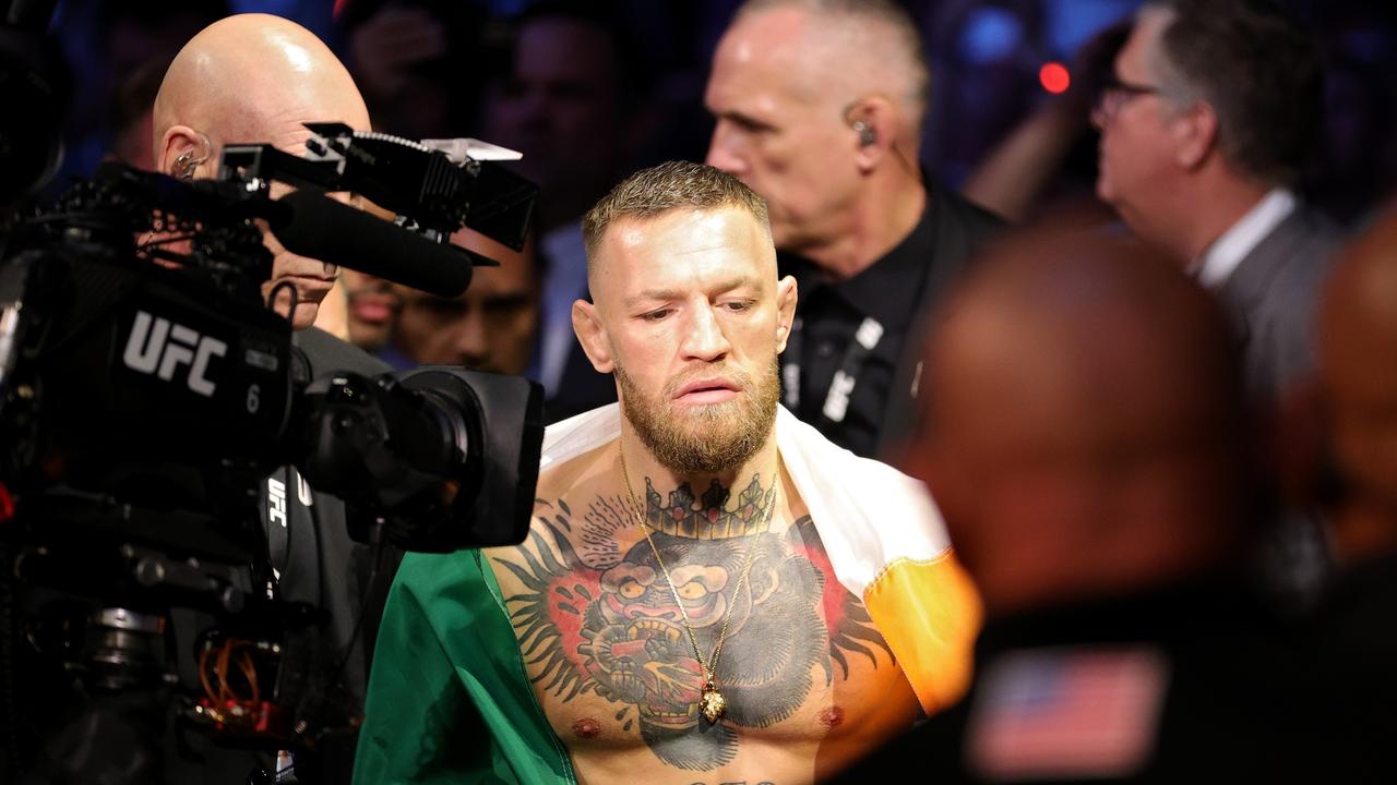 Despite his nasty injury, McGregor has vowed to return. (Photo by Stacy Revere/Getty Images)