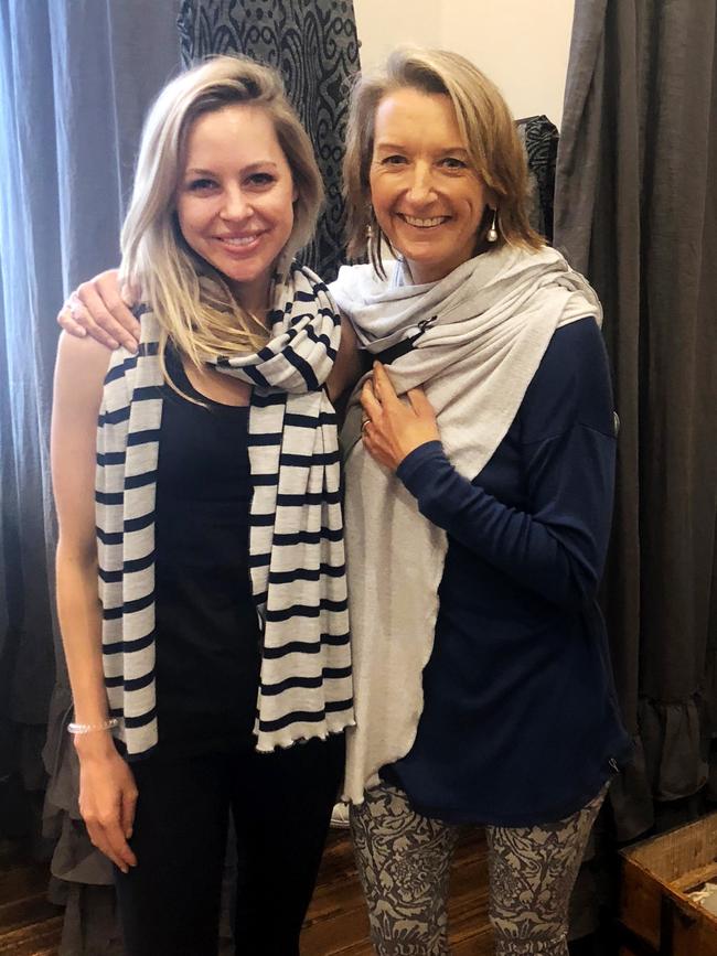 Holly Bowden and Layne Beachley during one of the surfer’s visits to the Smitten Merino store in Battery Point.