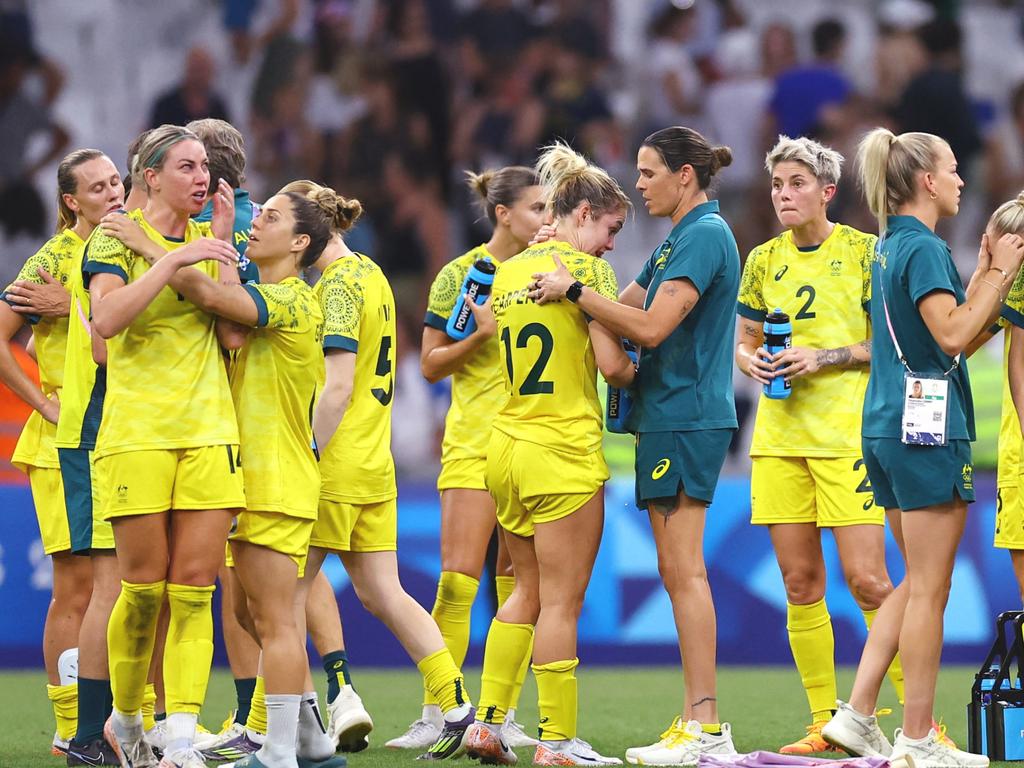 Australia players were dejected after another their early exit. Picture: Reuters