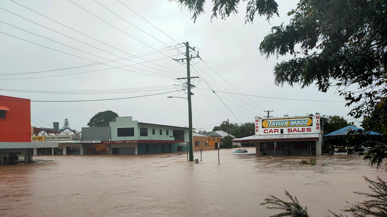 The flooding in Murwillumbah’s town centre on Monday morning had already submerged cars.