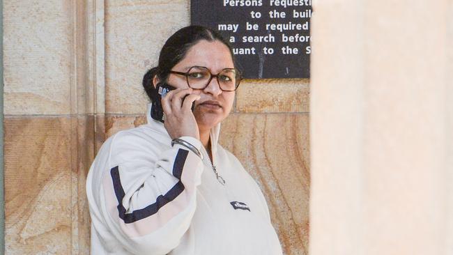 Harpreet Kaur, the disgraced fake nurse who tried to trick clients into thinking she was the real, leaves the Adelaide Magistrates Court. Picture: Brenton Edwards