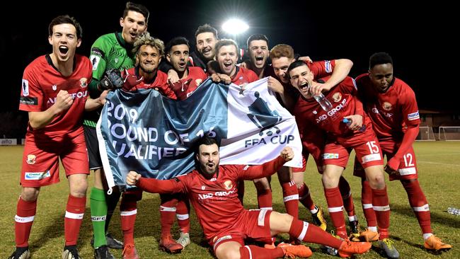 Hume City celebrates its FFA Cup win over Tigers FC.