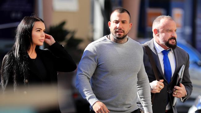 Defence Solicitor Campbell McCallum (right) , Harley Barbaro and Hayley Isabella Webb walk in Southport Courthouse. Photo Scott Powick Newscorp