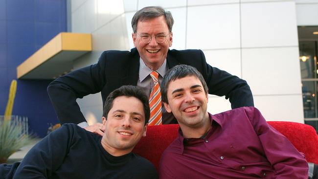 Then Google CEO Eric Schmidt, top, and co-founders Sergey Brin, left, and Larry Page pose at the company's headquarters in Mountain View, California in 2004.