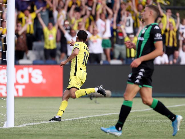 Ulises Alejando Davila Plascenia celebrates his goal pointing to the Wellington Phoenix fans.