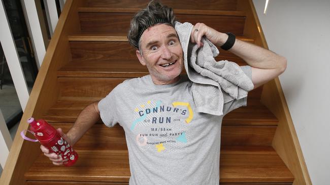 Connor's Run ambassador Dave Hughes takes a breath from running up and down the stairs in preparation for the September event. Picture: David Caird