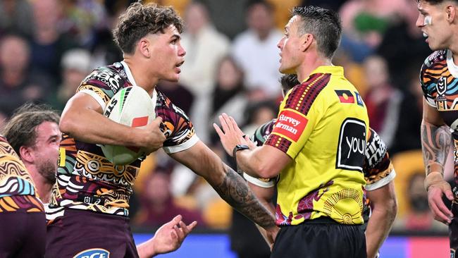 BRISBANE, AUSTRALIA - MAY 18: Reece Walsh of the Broncos talks to referee Adam Gee during the round 12 NRL match between Brisbane Broncos and Penrith Panthers at Suncorp Stadium on May 18, 2023 in Brisbane, Australia. (Photo by Bradley Kanaris/Getty Images)