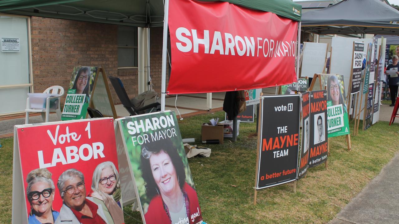 Signs galore at the Batemans Bay Community Centre voting booth. Picture: Tom McGann.