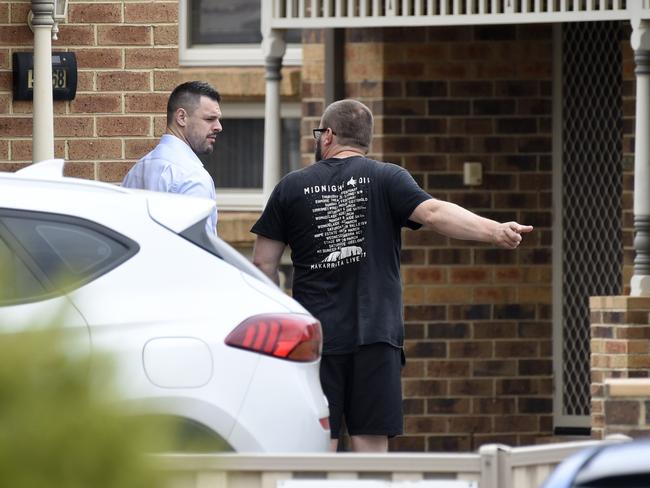 Police speak to neighbours. Picture: Andrew Henshaw