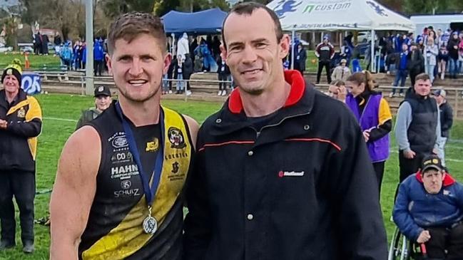 Best on ground (Hurn Family Medal) Brad Hoepner with sa footy legend and AFL premiership player Shannon Hurn. Picture: Barossa Light and Gawler Football Association