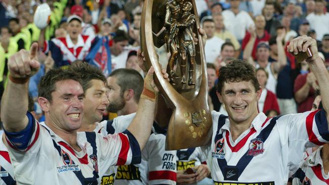 Flashback to October 6, 2002 and Brad Fittler, Luke Ricketson and Brett Mullins hold up the NRL trophy. Picture: Lindsay Moller.