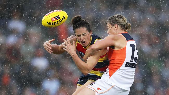 SYDNEY, AUSTRALIA - FEBRUARY 25:  (EDITORS NOTE: Retransmission with alternate crop.) Angela Foley of the Crows is tackled by Cora Staunton of the Giants during the round four AFLW match between the Greater Western Sydney Giants and the Adelaide Crows at Blacktown International Sportspark on February 25, 2018 in Sydney, Australia.  (Photo by Matt King/Getty Images)