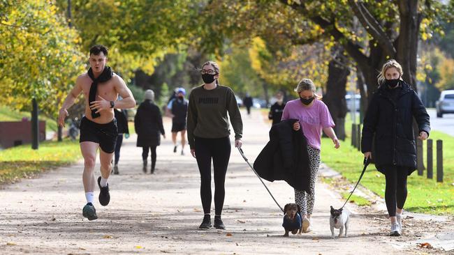 Masks remain mandatory outside of home, with several exemptions including exercise. Picture: William West