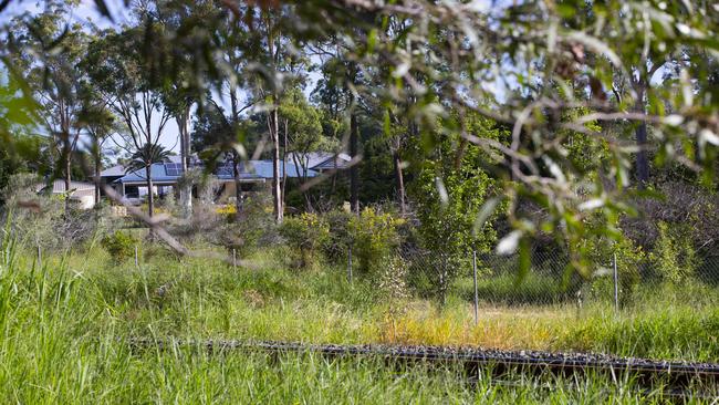 Stan and Suz Corbett have been campaigning against the INland Rail for many years. Thursday, March 19, 2020. The Hillcrest/Forestdale corridor. (AAP Image/Renae Droop)