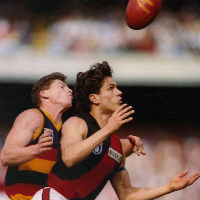 Gavin Wanganeen marks in front of Mark Bickley. Picture: Advertiser Library