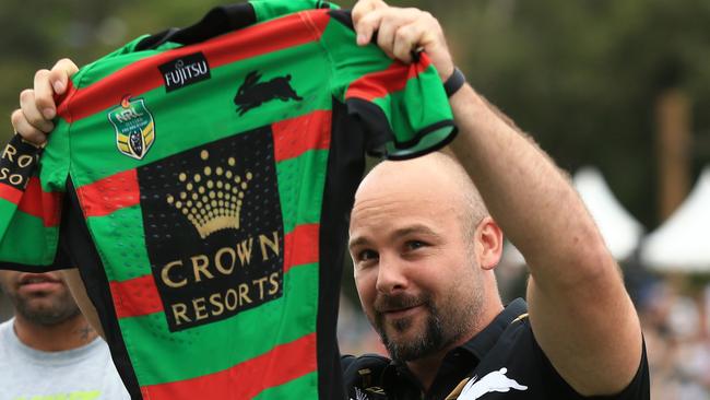 Glenn Stewart is presented with his jersey before the Back to Redfern pre-season game between Souths and Northern Pride at Redfern Oval. pic Mark Evans