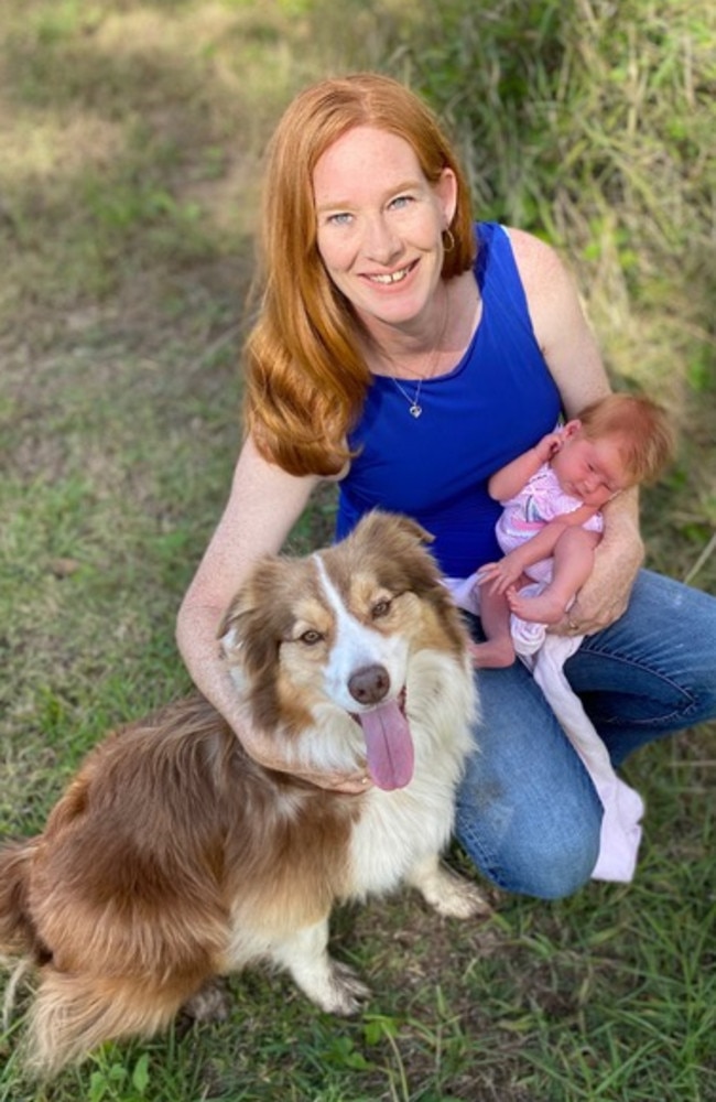 Kirsty Da Silva, 40, with newborn Jaylen and Kiah the border collie, 7. Picture: Kirsty Da Silva