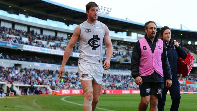 Sam Rowe heads to the changerooms after his knee injury, but ended up back on the ground. Picture: Getty Images