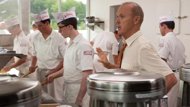 Michael Keaton as Ray Kroc, rallying his young trainees in a scene from The Founder.