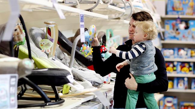 Toby Harpham with his son Fred shopping at a Baby Bunting store. Picture: Adam Smith