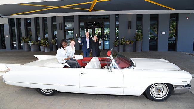 Atura Hotel Prospect. A 1960 white cadillac is now part of the hotel's Time Warp package where people can see a movie at the nearby Skyline Drive-in.