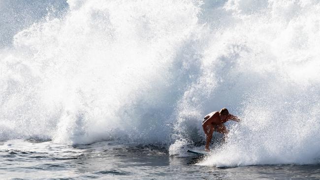 The Bureau of Meteorology has issued hazardous surf warnings for parts of the state’s coast. Picture: NewsWire / Monique Harmer
