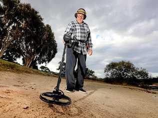 SEARCHING: 78 Year old Alan Davis from Pottsville gets around the Tweed Coast with his metal detector, collecting lost items for free. Picture: Scott Powick