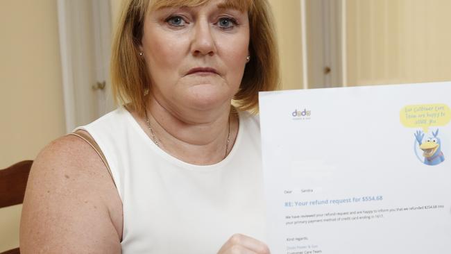 Sandra holds up a letter from her energy provider Dodo after her hacking. Pictures: David Swift