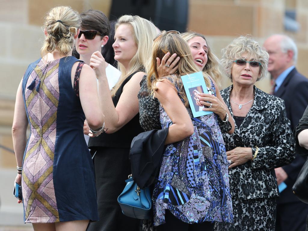 22. There were emotional scenes as Katrina Dawson’s friends and family farewelled the mother of three at a memorial service at the University of Sydney’s Great Hall on December 23. Her son Ollie said: “Mummy is in heaven  heaven is in my heart, so mum will be with me all the time.” Picture: Adam Taylor