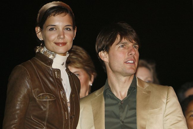 Smart casual and carefree .... Katie Holmes with husband Tom Cruise at the Ocean Drive/Market America Super Bowl XLI party in 2007 in the South Beach section of Miami Beach, Florida. Photo: AP