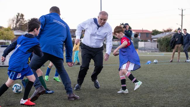 The PM practising soccer with the Devonport Strikers under-8s. Picture: Jason Edwards