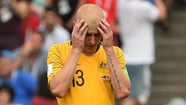 Australia's Aaron Mooy reacts after Peru score their 2nd goal during their final FIFA World Cup group match at Fisht Stadium during the FIFA 2018 World Cup in Sochi, Russia, Tuesday, June 26, 2018. (AAP Image/Dean Lewins) NO ARCHIVING