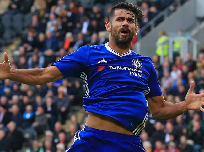 Chelsea's Brazilian-born Spanish striker Diego Costa celebrates after scoring their second goal during the English Premier League football match between Hull City and Chelsea at the KCOM Stadium in Kingston upon Hull, north east England on October 1, 2016. / AFP PHOTO / Lindsey PARNABY / RESTRICTED TO EDITORIAL USE. No use with unauthorized audio, video, data, fixture lists, club/league logos or 'live' services. Online in-match use limited to 75 images, no video emulation. No use in betting, games or single club/league/player publications. /