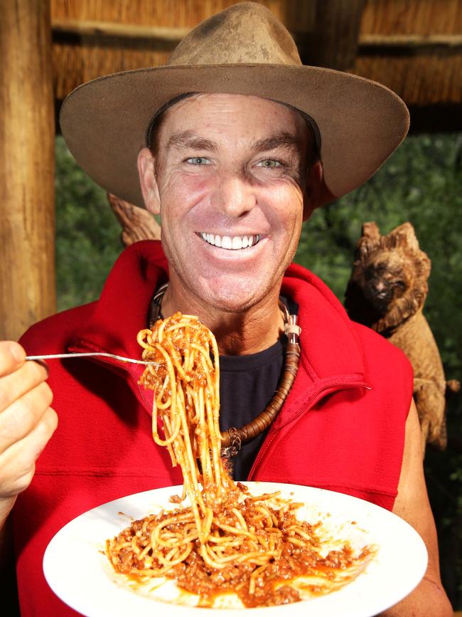 Warnie enjoys spaghetti soon after leaving the I’m a Celebrity Jungle.