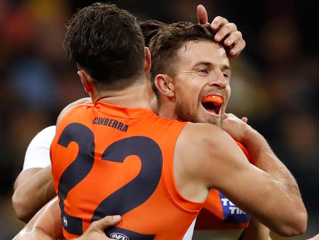 Brett Deledio and Josh Kelly celebrate during the semi-final win over West Coast. (Photo by Adam Trafford/AFL Media/Getty Images)