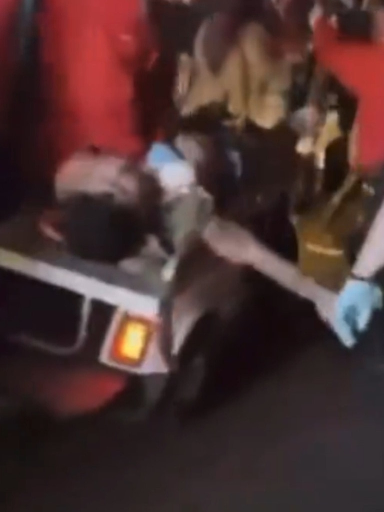 Footage shared on social media shows one festivalgoer receiving CPR on the back of a gulf buggy as it tries to get through the crowd. Picture: Apple Music/supplied