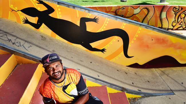 Artist Nicky Bidju Pryor, Bidju Designs, in front of his latest collaboration at Riverway Skate Park. Picture: Shae Beplate.