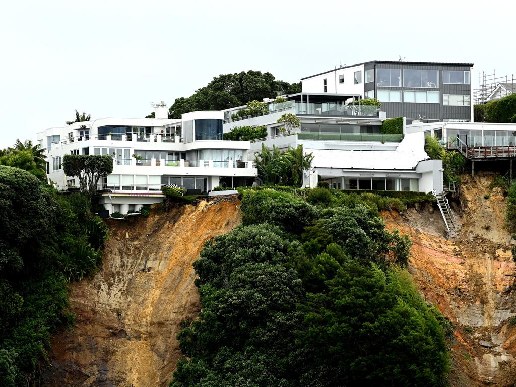 Houses on the cliffs are teetering over the edge, as fearful residents await more heavy rain. Picture: Hannah Peters / Getty Images