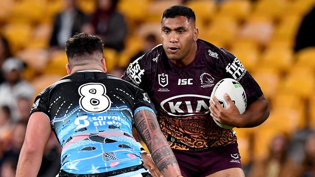 BRISBANE, AUSTRALIA – JULY 31: Tevita Pangai Junior of the Broncos takes on the defence of Braden Hamlin-Uele of the Sharks during the round 12 NRL match between the Brisbane Broncos and the Cronulla Sharks on July 31, 2020 in Brisbane, Australia. (Photo by Bradley Kanaris/Getty Images)