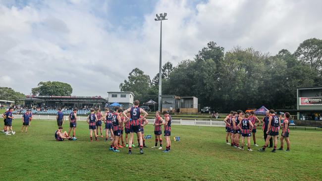 Wilston Grange players break off into huddles during a quarter time break earlier in the season. Photos by Stephen Archer