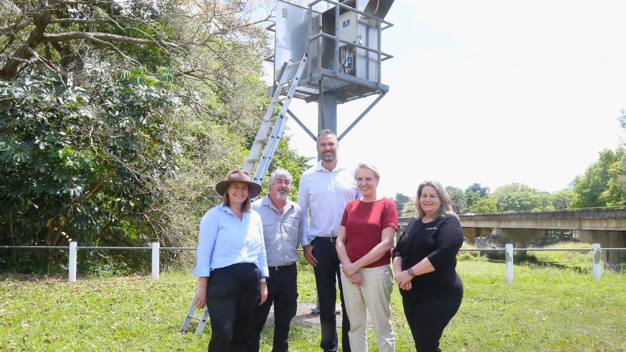 Senator Nita Green, BOM technician Alex Hoy, Labor candidate for Leichhardt Matt Smith, Federal Environment Minister Tanya Plibersek and BOM hub support lead Judy Calleja at the Kamerunga river height station. Picture: Peter Carruthers