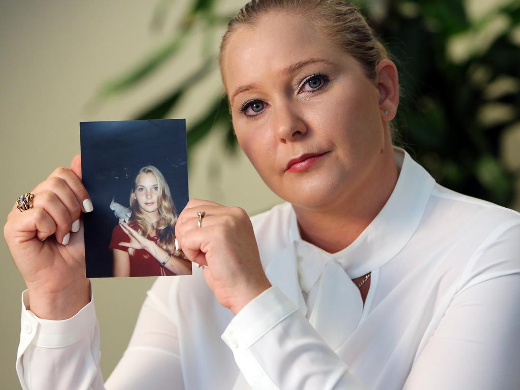 Virginia Roberts holds a photo of herself at age 16, when she alleges Palm Beach multi-millionaire Jeffrey Epstein began abusing her sexually. Picture: Getty Images.