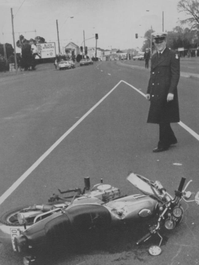 A motorbike lies on Hoddle St after its rider was shot dead by Knight.